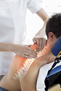 Highlighted spine of man at physiotherapy